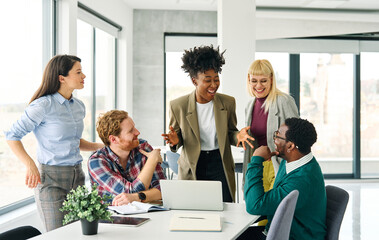 Group of young business people using laptop having a meeting or presentation and seminar in the...