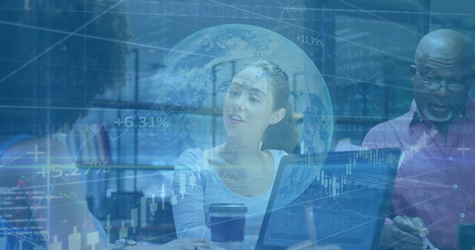 Reviewing stock charts, Korean woman leading discussion in office, with laptops and digital charts - Powered by Adobe