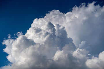 Majestic Cumulus Cloud Formation in a Deep Blue Summer Sky.