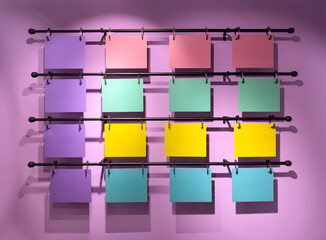 Rows of pastel paper canvases create harmony perfect for product mockups and color research