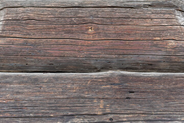 Wooden background, empty surface. old boards are dark brown. Wooden photophone in a rustic style