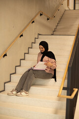 Muslim young student girl in university.