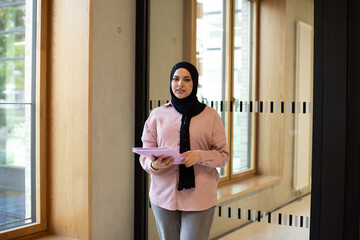 Young student girl in university.