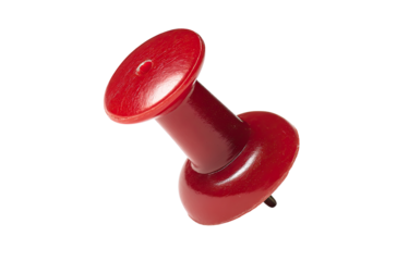 Close-up of a red push pin against a black background.  The pin's rounded top and base are smooth and glossy.  Its pointed end extends