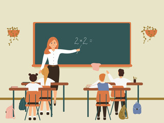 Female math teacher explaining multiplication to elementary school pupils or children near chalkboard. Young woman teaching mathematics or arithmetic to kids sitting at desks in class.Raster