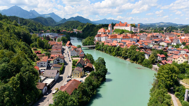 Drone photo of Fuessen and river Lech with Alps and old town