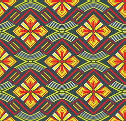 Colorful, Vibrant Ethnic Pattern Geometric Shapes, Floral Motifs, And Zigzag Lines In A Seamless Repeat, Ideal For Textiles Or Backgrounds.