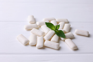mint chewing gum and mint on the table. Fresh breath, oral care 