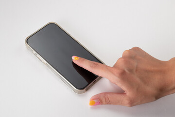 Caucasian woman's hand touching a smartphone screen (mockup), isolated on white background