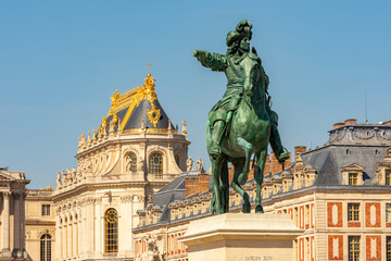 Naklejka premium Monument to king Louis XIV at Versailles palace, Paris suburbs, France