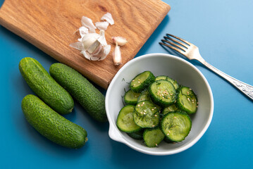 Fresh cucumber salad with dill and sesame seeds