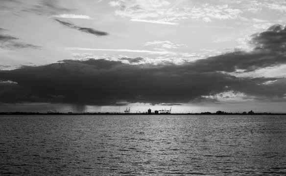 Storm clouds in sunrise black and white