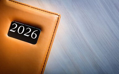 Detail of a diary for the year 2026, clean desk backgrounds