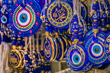 Evil eye or nazar amulet, colorful souvenirs at Grand Bazaar, Istanbul, Turkey
