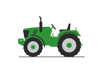 Vibrant green tractor stands on a horizon ready for the field