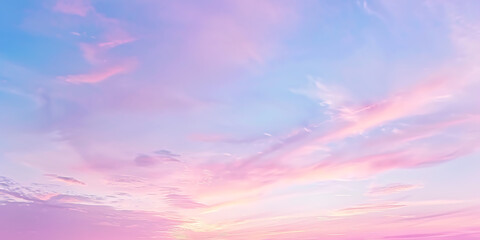 Obraz premium Pastel sky with wispy clouds at sunset 