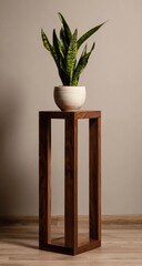 A dark wood plant stand with a simple, rectangular frame supports a white pot containing a snake plant against a muted background