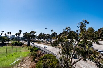 I-5 In San Diego at the Park Boulevard Exit.  Seen is a plan flying overhead.