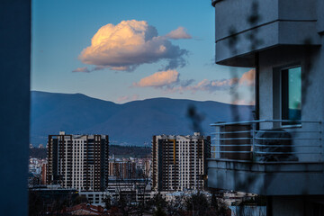 sunny day in capital city of macedonia with one cloud and blue sky