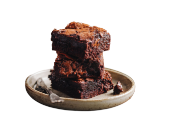 Indulgent stack of rich chocolate brownies with gooey melted center, perfect for tempting dessert cravings and culinary inspiration.