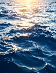 Close-up view of rippling ocean water at sunset