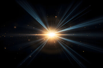 Bright starburst flare with light rays and dust particles on black background