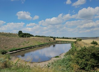 A river with a small dam