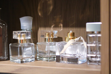 Elegant Collection of Perfume Bottles on Wooden Shelf Ikea