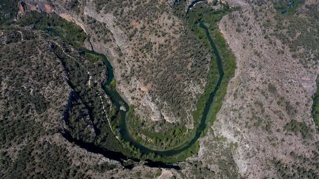 Aerial view of the Hoces del Cabriel Natural Reserve. The waters of Cabriel river, main affluent of the bigger J&uacute;car river, meander serving as natural border between Cuenca, Valencia and Albacete.