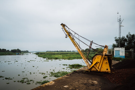 A pier on a lake in Mexico on a cloudy, nostalgic day. Patzcuaro, Michoacan.