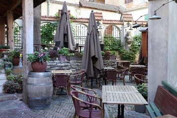 Outdoor cafe with stylish furniture and decor