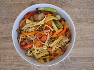 Asian-Inspired Vegetable Noodles with Colorful Sliced Veggies – Top View
