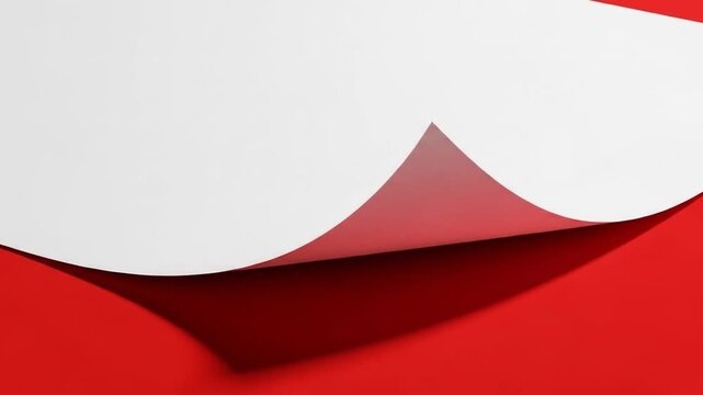 Red Backdrop and Curled Corner: A vivid composition showcasing a sheet of paper with a gracefully curled corner against a striking red backdrop.