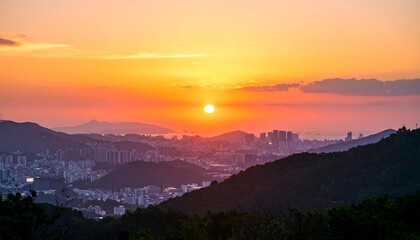 City sunset over hills