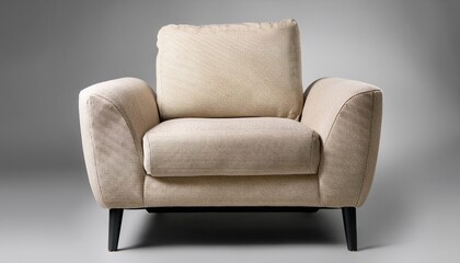Fototapeta premium modern beige armchair with textured back and sides isolated on ash background