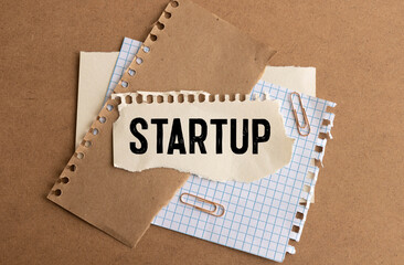 Concept Start Up. A lot of red rocket on a gray background.