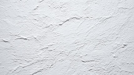 Smooth white wall with subtle texture imperfections, minimalistic and clean surface under even lighting.

