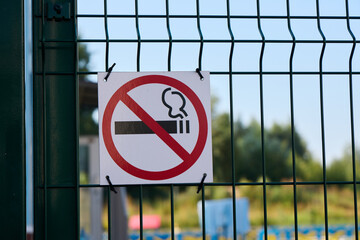 Please take notice of the No Smoking Sign located prominently on the Fence in the Outdoor Area