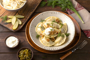 Delicious Polish Pierogi with Sour Cream and Dill
