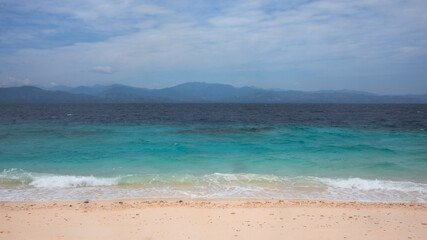 Tropical Beach with Turquoise Waters and White Sand