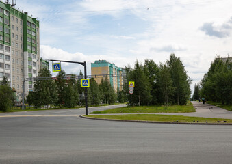 The intersection of Sovetskaya and Lenin streets in the city of Noyabrsk in summer