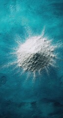 Powder explosion on teal surface