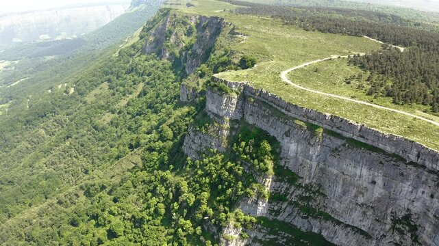 Aerial view with zoom out over cliffs of the Nervion River Canyon, in the north of the Spanish province of Burgos.