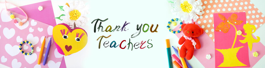 Paper and fabric flowers, smiling cute heart, beads, handmade jewelry, Painted Text Thank You Teachers. Handwriting on white background.  Preschool Education, scrapbook. Creativity.