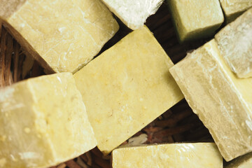 Handmade soap bars displayed in a natural setting