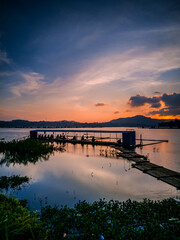 The beauty of the sunset at the Darma Reservoir in Kuningan, West Java. Seeing it soothes the heart and makes you want to linger.