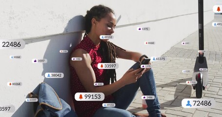 Social media creator settling on sidewalk and scrolling phone, spawning alerts with counts rising - Powered by Adobe