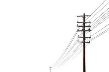 A weathered wooden utility pole with numerous electrical wires extending outward