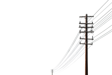 A weathered wooden utility pole with numerous electrical wires extending outward