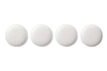 Four identical, round, white pills in a row